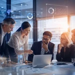 Corporate executive team collaborating around a board table analyzing dynamic financial charts, global metrics, and AI analytics projected on digital screens.